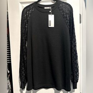 NWT Women’s blouse/shirt.